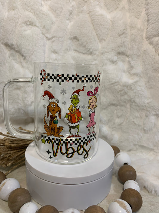 17 oz Grinch coffee mug. Comes within bamboo lid and straw.