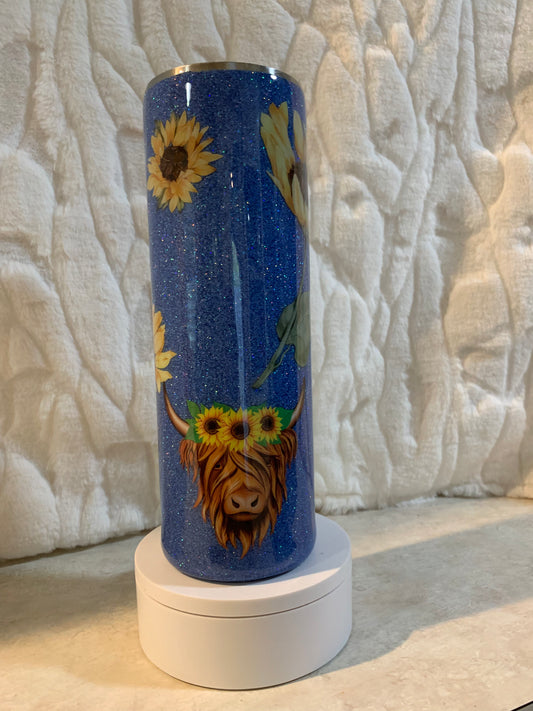 30oz stainless steel tumbler. Blue with daisies and cow. Comes with lid and straw.
